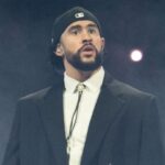 Bad Bunny looks towards the fans on stage during his “Most Wanted Tour” at Bridgestone Arena in Nashville, Tenn., Saturday, May 11, 2024.