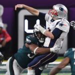 Philadelphia Eagles defensive end Brandon Graham (55) sacks New England Patriots quarterback Tom Brady (12) to fumble the ball in the fourth quarter in Super Bowl LII at U.S. Bank Stadium.
