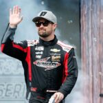 Mar 2, 2025; Austin, Texas, USA; NASCAR Cup Series driver Ricky Stenhouse Jr (47) walks out onto the stage for driver introductions before the EchoPark Automotive Grand Prix at Circuit of the Americas.