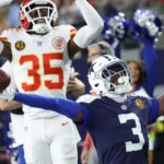 Dallas Cowboys wide receiver George Pickens (3) celebrates after catching a pass for a successful two-point conversion against Kansas City Chiefs cornerback Jaylen Watson (35) during the fourth quarter at AT&T Stadium.