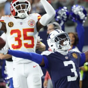 Dallas Cowboys wide receiver George Pickens (3) celebrates after catching a pass for a successful two-point conversion against Kansas City Chiefs cornerback Jaylen Watson (35) during the fourth quarter at AT&T Stadium.