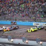 Nov 1, 2025; Avondale, Arizona, USA; NASCAR Xfinity Series driver Connor Zilisch (88) leads the restart during the Xfinity Series Championship race at Phoenix Raceway
