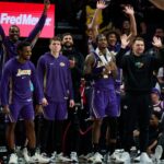 Nov 3, 2025; Portland, Oregon, USA; The Los Angeles Lakers celebrate during the second half in the closing minutes during a game between the Portland Trail Blazers and the Los Angeles Lakers at Moda Center.