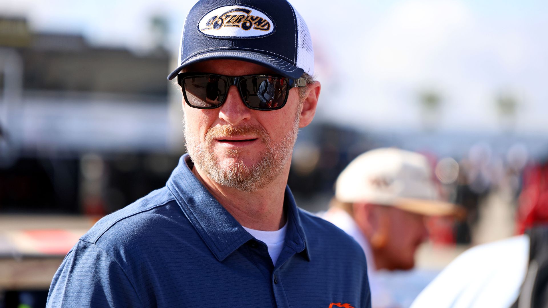 Feb 12, 2025; Daytona Beach, Florida, USA; NASCAR team owner Dale Earnhardt Jr. looks on during practice for the Daytona 500 at Daytona International Speedway