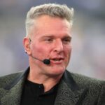 ESPN analyst Pat McAfee broadcasts live from the sidelines of Acrisure Stadium in Pittsburgh, PA prior to the start of the Pittsburgh Panthers vs Notre Dame Fighting Irish game on November 15, 2025