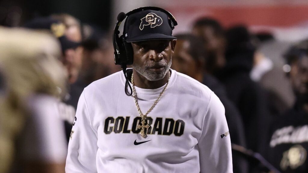 Colorado Buffaloes head coach Deion Sanders looks on during a time out in the game against the Utah Utes during the second quarter at Rice-Eccles Stadium.