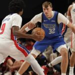 Dallas Mavericks v Detroit Pistons Cooper Flagg 32 of Dallas Mavericks drives the ball during the Match against Detroit Pistons at Mexico City Arena.