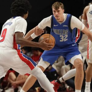 Dallas Mavericks v Detroit Pistons Cooper Flagg 32 of Dallas Mavericks drives the ball during the Match against Detroit Pistons at Mexico City Arena.