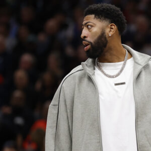 Nov 8, 2025; Washington, District of Columbia, USA; Injured Dallas Mavericks forward Anthony Davis looks on from the bench during a timeout against the Washington Wizards in the second half at Capital One Arena