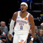 Nov 9, 2025; Memphis, Tennessee, USA; Oklahoma City Thunder guard Shai Gilgeous-Alexander (2) reacts after a three point basket during the fourth quarter against the Memphis Grizzlies at FedExForum.