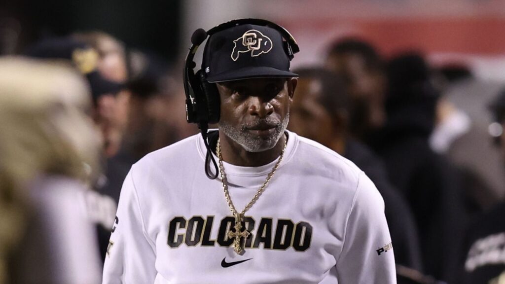 Colorado Buffaloes head coach Deion Sanders looks on during a time out in the game against the Utah Utes during the second quarter at Rice-Eccles Stadium.