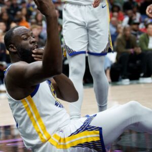 Golden State Warriors forward Draymond Green (23) asks for a review after colliding with New Orleans Pelicans forward Trey Murphy III (25) during the first half at Smoothie King Center
