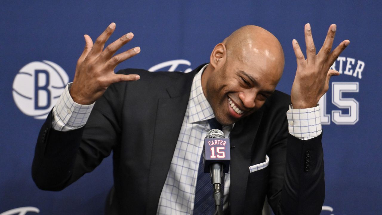 Former NBA star Vince Carter speaks at a jersey retirement press conference before a game between the Brooklyn Nets and the Miami Heat at Barclays Center.