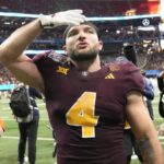 Arizona State running back Cam Skattebo (4) blows a kiss toward fans after Texas won 39-31 in double overtime in the Chick-fil-A Peach Bowl in Atlanta on Jan. 1, 2025.