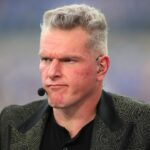 ESPN analyst Pat McAfee broadcasts live from the sidelines of Acrisure Stadium in Pittsburgh, PA prior to the start of the Pittsburgh Panthers vs Notre Dame Fighting Irish game on November 15, 2025.