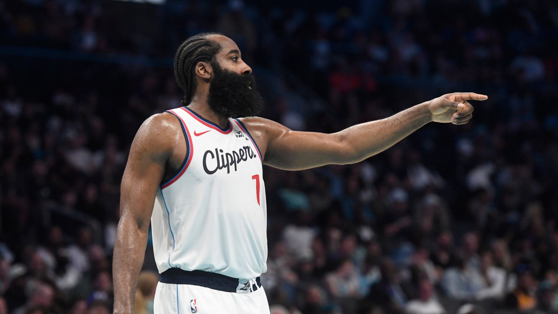 Nov 22, 2025; Charlotte, North Carolina, USA; Los Angeles Clippers guard James Harden (1) signals to his teammates during the second half against the Charlotte Hornets at the Spectrum Center