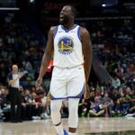 Golden State Warriors forward Draymond Green (23) shouts “Angel Reese” after missing several shots in a row and rebounding them himself during the first half against the New Orleans Pelicans at Smoothie King Center.