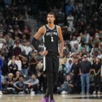 Nov 8, 2025; San Antonio, Texas, USA; San Antonio Spurs forward Victor Wembanyama (1) looks up in the second half against the New Orleans Pelicans at Frost Bank Center.