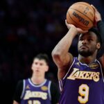 Nov 3, 2025; Portland, Oregon, USA; Los Angeles Lakers guard Bronny James (9) shoots a foul shot during the second half against the Portland Trail Blazers at Moda Center.