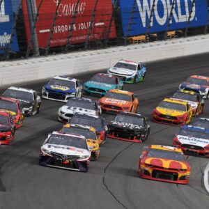 Jun 30, 2019; Joliet, IL, USA; NASCAR Cup Series driver Kevin Harvick (4) leads the field during the Camping World 400 at Chicagoland Speedway