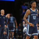Nov 3, 2025; Memphis, Tennessee, USA; Memphis Grizzlies guard Ja Morant (12) checks into the game during the second quarter against the Detroit Pistons at FedExForum
