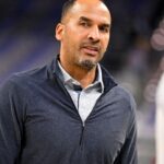 Oct 6, 2025; Fort Worth, Texas, USA; Dallas Mavericks general manager Nico Harrison looks on before the game against the Oklahoma City Thunder at Dickie's Arena.
