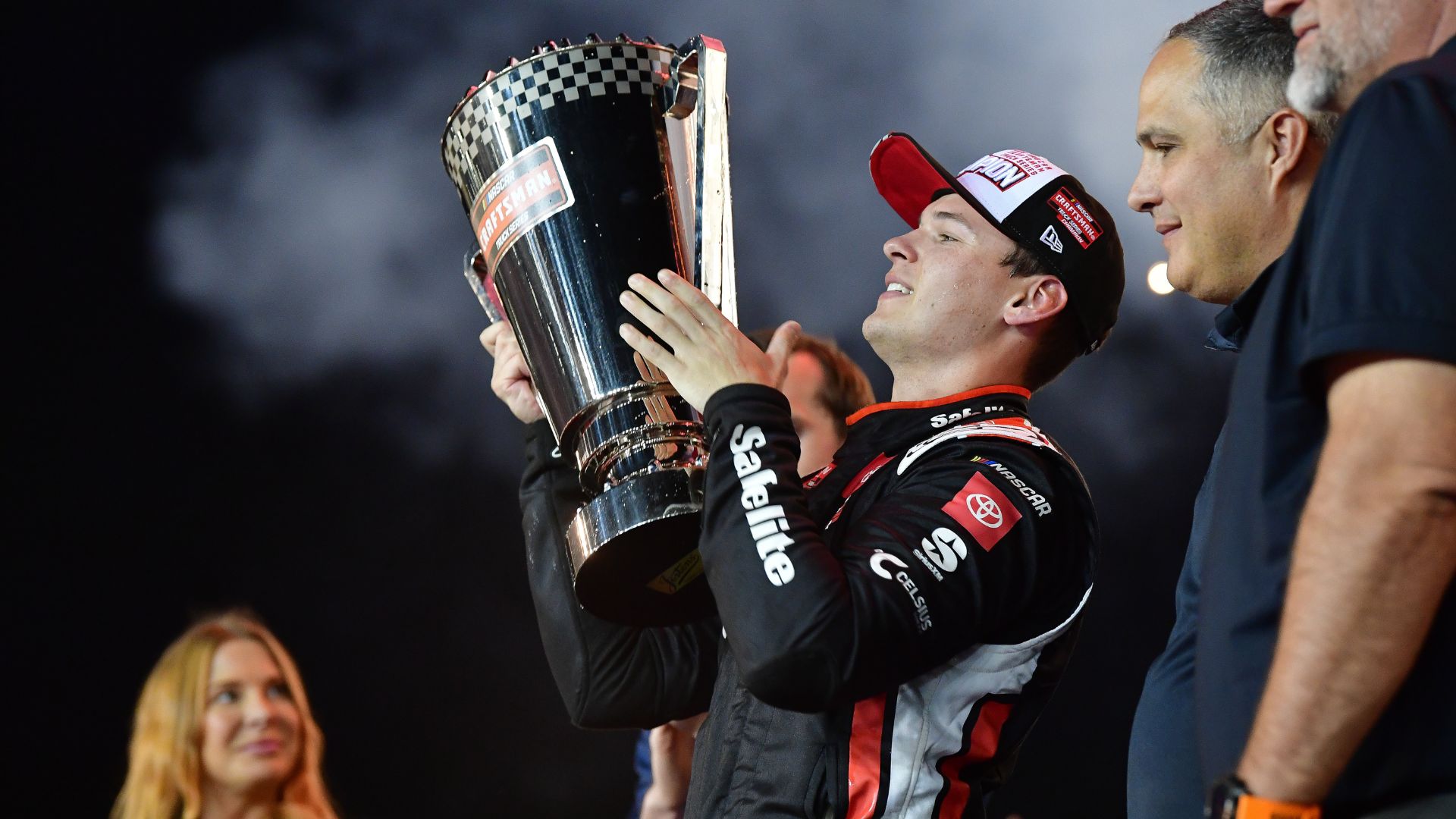 Oct 31, 2025; Avondale, Arizona, USA; NASCAR Gander RV and Outdoors Truck Series driver Corey Heim (11) celebrates his victory following the Truck Series Championship race at Phoenix Raceway