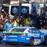Nov 2, 2025; Avondale, Arizona, USA; NASCAR Cup Series driver Denny Hamlin (11) makes a pit stop during the NASCAR Championship race at Phoenix Raceway.