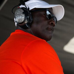Aug 10, 2025; Watkins Glen, New York, USA; NASCAR Cup Series owner Michael Jordan looks on from atop his team’s pit box during the Go Bowling at The Glen at Watkins Glen International.