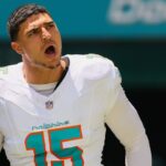 Miami Dolphins linebacker Jaelan Phillips (15) runs onto the field before the game against the Jacksonville Jaguars at Hard Rock Stadium.