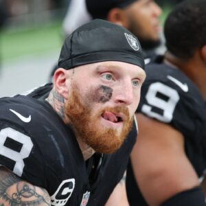 Las Vegas Raiders defensive end Maxx Crosby (98) looks on from the sideline during the first quarter against the Chicago Bears at Allegiant Stadium.
