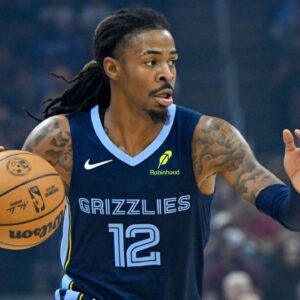 Memphis Grizzlies guard Ja Morant (12) dribbles the ball in the first quarter against the Cleveland Cavaliers at Rocket Arena