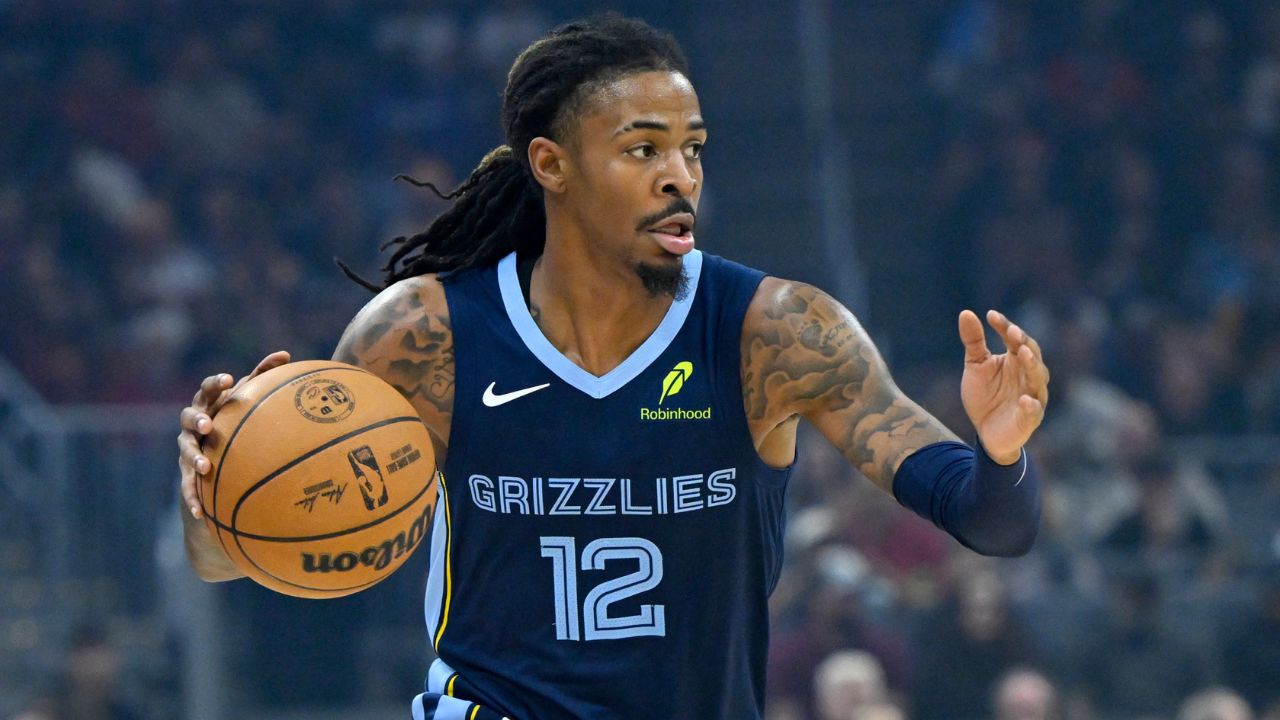 Memphis Grizzlies guard Ja Morant (12) dribbles the ball in the first quarter against the Cleveland Cavaliers at Rocket Arena