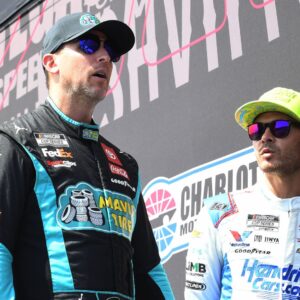 ATLANTA, GA - SEPTEMBER 08: Denny Hamlin ( 11 Joe Gibbs Racing Mavis Tire Toyota) and Kyle Larson ( 5 Hendrick Motorsports HendrickCars.com Chevrolet) talk prior to the running of the NASCAR, Motorsport, USA Cup Series Quaker State 400