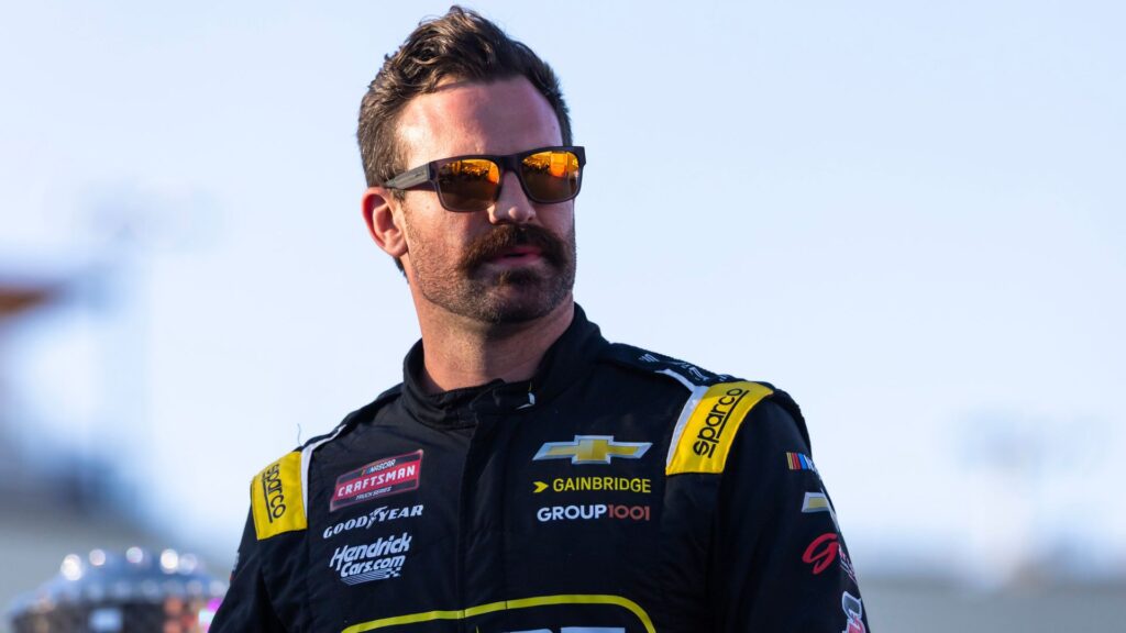 Oct 31, 2025; Avondale, Arizona, USA; NASCAR Truck Series driver Corey LaJoie (77) during the NASCAR Truck Series Championship race at Phoenix Raceway