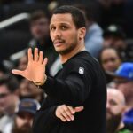 Boston Celtics head coach Joe Mazzulla calls a play in the second quarter against the Milwaukee Bucks at Fiserv Forum.