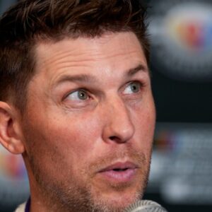 Aug 31, 2023; Charlotte, North Carolina, USA; Denny Hamlin answers questions from the media at Charlotte Convention Center.