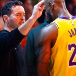 Dec 23, 2025; Phoenix, Arizona, USA; Los Angeles Lakers forward LeBron James (23) and head coach JJ Redick against the Phoenix Suns at Mortgage Matchup Center.