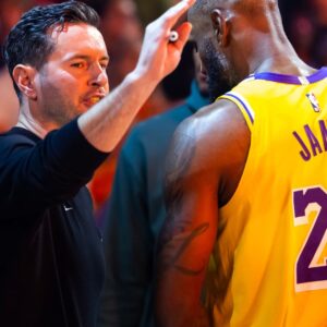 Dec 23, 2025; Phoenix, Arizona, USA; Los Angeles Lakers forward LeBron James (23) and head coach JJ Redick against the Phoenix Suns at Mortgage Matchup Center.
