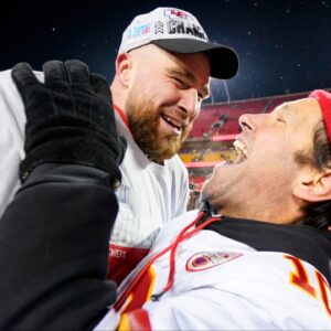 Kansas City Chiefs tight end Travis Kelce (87) celebrate with actor Paul Rudd after winning the AFC Championship game against the Cincinnati Bengals at GEHA Field at Arrowhead Stadium.