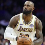 Los Angeles Lakers forward Lebron James (23) shoots against the Philadelphia 76ers during the fourth quarter at Xfinity Mobile Arena.