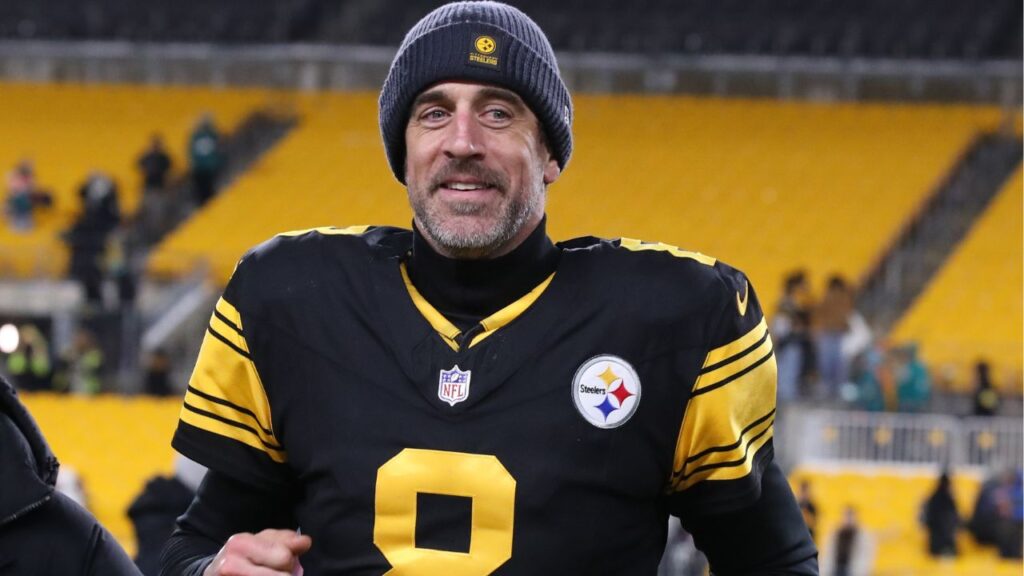 Pittsburgh Steelers quarterback Aaron Rodgers (8) runs off the field after the game against the Miami Dolphins at Acrisure Stadium.