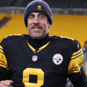 Pittsburgh Steelers quarterback Aaron Rodgers (8) runs off the field after the game against the Miami Dolphins at Acrisure Stadium.