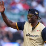 NFL Hall of Fame wide receiver Terrell Owens of the American League shows emotion during the 2025 All Star Celebrity Softball Game at Truist Park.
