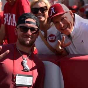 Former Texas A&M Aggies quarterback Johnny Manziel poses with Alabama Crimson Tide fans during a game against the Vanderbilt Commodores at Saban Field at Bryant-Denny Stadium.