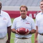 University of Alabama head coach Nick Saban poses with offensive coordinator Mike Locksley, left, and defensive coordinator Tosh Lupoi, right, on the Alabama campus in Tuscaloosa, Ala. on Saturday August 4, 2018. Media18