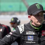 Sep 27, 2025; Kansas City, Kansas, USA; Tyler Reddick before NASCAR Cup Series qualifying at Kansas Speedway.