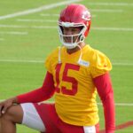 Kansas City Chiefs quarterback Patrick Mahomes (15) stretches during training camp at Missouri Western State University.