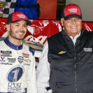 May 30, 2021; Concord, North Carolina, USA; NASCAR Cup Series driver Kyle Larson (5) celebrates his win with team owner Rick Hendrick at the Coca-Cola 600 at Charlotte Motor Speedway. Mandatory Credit: Jim Dedmon-Imagn Images