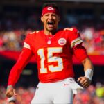 Kansas City Chiefs quarterback Patrick Mahomes (15) gets ready prior to a game against the Indianapolis Colts at GEHA Field at Arrowhead Stadium.